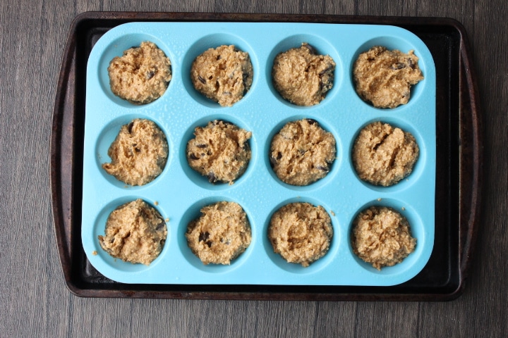 Image of pumpkin muffin raw batter in silicone muffin pan