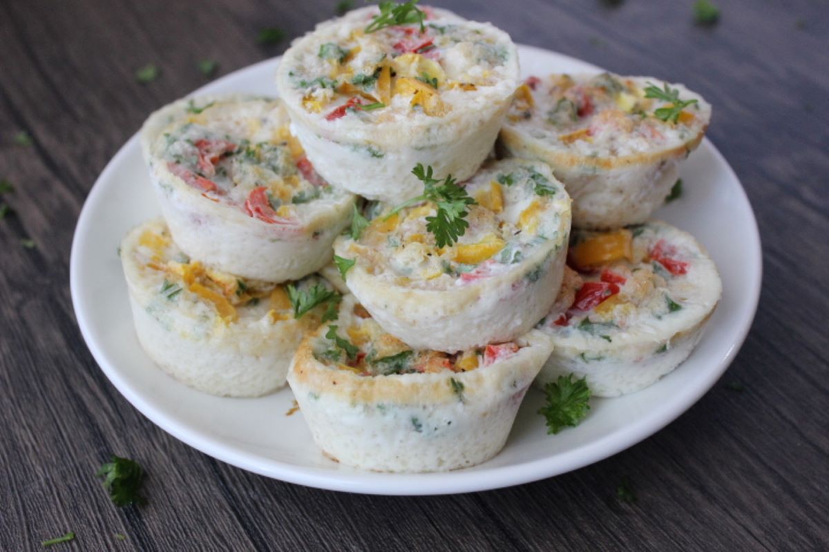 Image of egg white bites stacked on a plate.