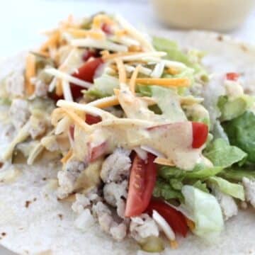 Image of Big Mac Wrap sitting opened face on counter